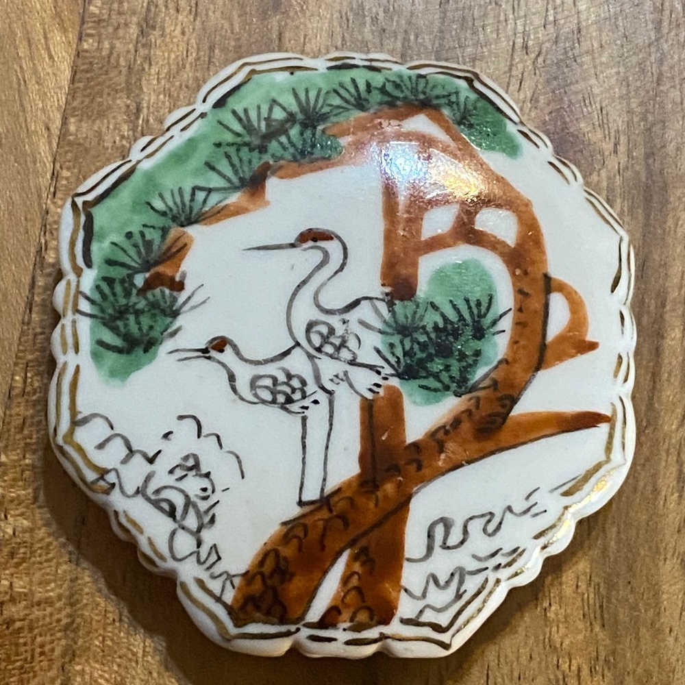 Vintage hand painted large ceramic bead. Storks